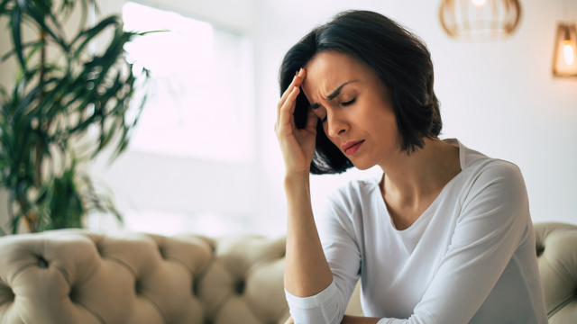pateint with headache needing chiropractor in New Braunfels