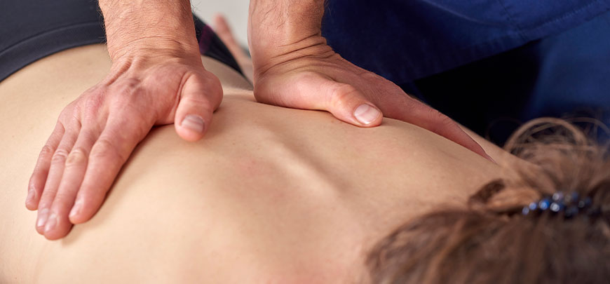patient receiving diversified technique in New Braunfels for auto accident injury relief