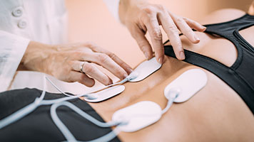 lectrical Muscle Stimulation Therapy for auto accident injury treatment in New Braunfels