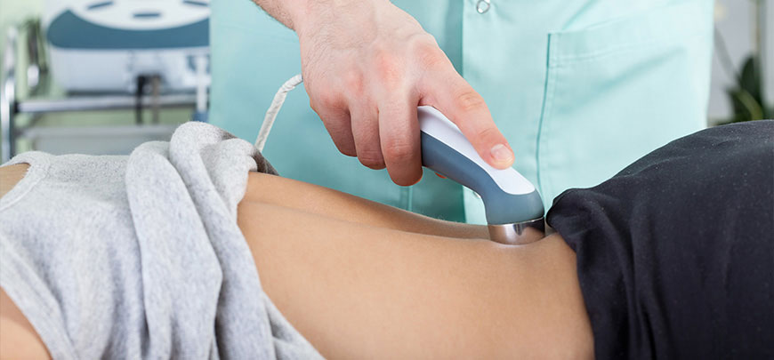 patient receiving ultrasound therapy in New Braunfels for auto accident injury relief